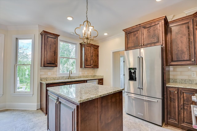 3549 Stevens Way, Martinez, GA 30907 - kitchen with appliances with stainless steel finishes, a chandelier, crown molding, backsplash, and hanging light fixtures