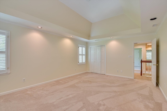 3549 Stevens Way, Martinez, GA 30907 - unfurnished bedroom with multiple windows, light carpet, a tray ceiling, recessed lighting, and ornamental molding