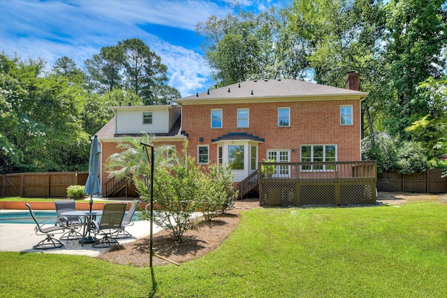3549 Stevens Way, Martinez, GA 30907 - back of property with a wooden deck, a fenced backyard, a patio area, a chimney, and brick siding