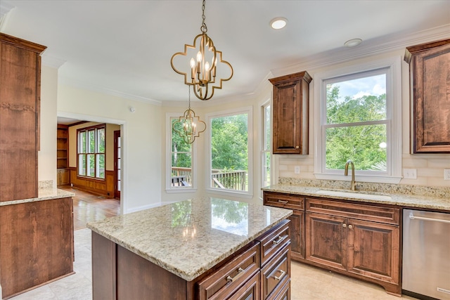 3549 Stevens Way, Martinez, GA 30907 - kitchen with stainless steel dishwasher, a chandelier, light stone counters, pendant lighting, and crown molding