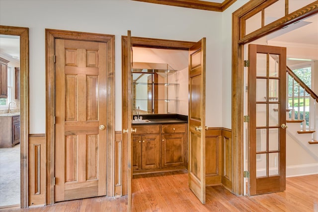 3549 Stevens Way, Martinez, GA 30907 - hall with crown molding, wainscoting, light wood-type flooring, and stairway