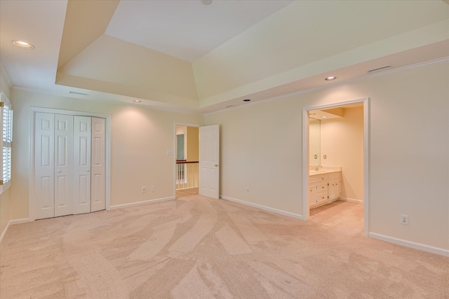 3549 Stevens Way, Martinez, GA 30907 - unfurnished bedroom featuring a tray ceiling, light carpet, recessed lighting, connected bathroom, and ornamental molding