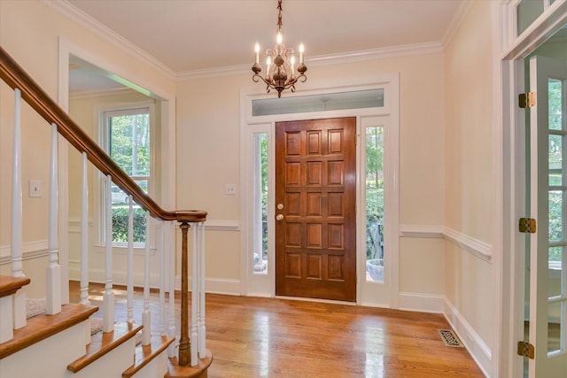 3549 Stevens Way, Martinez, GA 30907 - entrance foyer with stairway, light wood finished floors, crown molding, and a chandelier