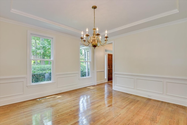 3549 Stevens Way, Martinez, GA 30907 - unfurnished room featuring plenty of natural light, a chandelier, light wood-style floors, crown molding, and a wainscoted wall