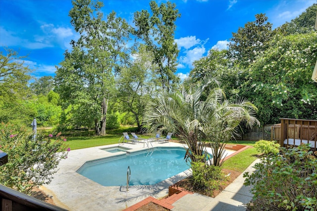 3549 Stevens Way, Martinez, GA 30907 - view of swimming pool with an in-ground hot tub, a patio area, and view of wooded area