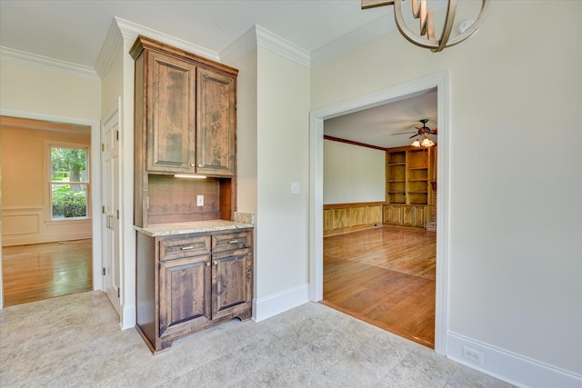 3549 Stevens Way, Martinez, GA 30907 - kitchen featuring crown molding, tasteful backsplash, light stone counters, ceiling fan, and light wood-style floors