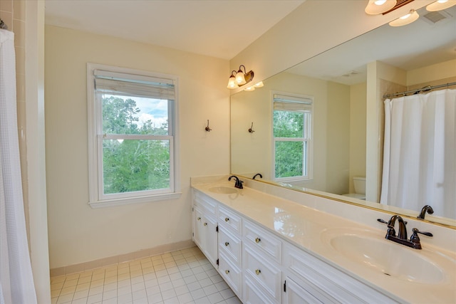 3549 Stevens Way, Martinez, GA 30907 - full bathroom featuring double vanity, tile patterned flooring, and a shower with shower curtain