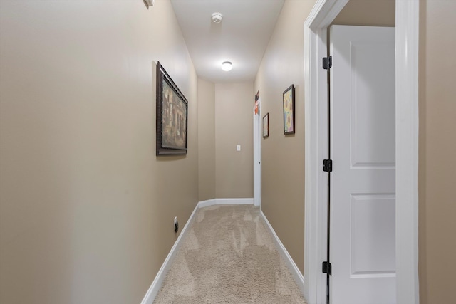 hallway with light carpet