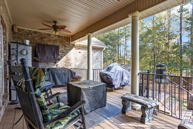 deck with ceiling fan and a grill