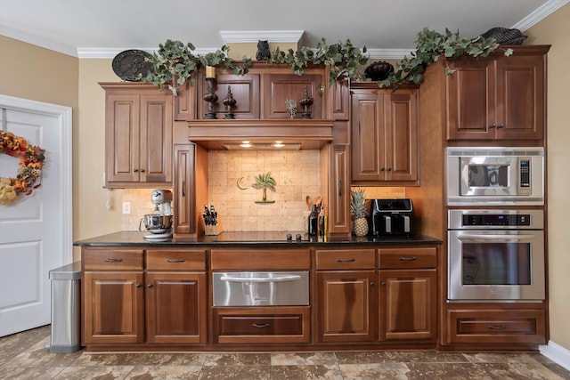 kitchen featuring decorative backsplash, crown molding, and appliances with stainless steel finishes