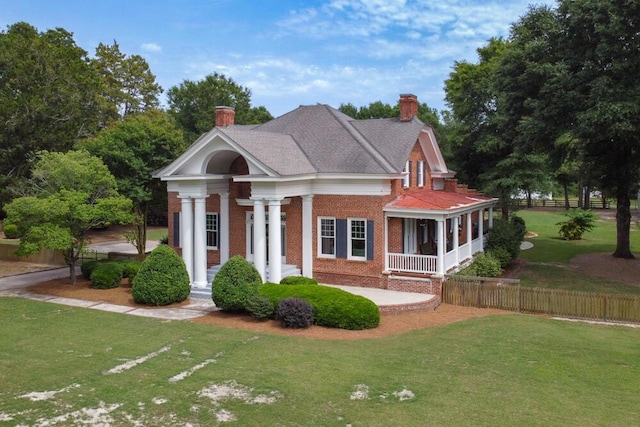 116 Jackson Rd, Jackson, SC 29831 - greek revival house featuring brick siding, a chimney, and a porch