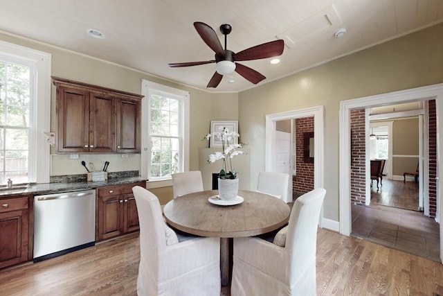 116 Jackson Rd, Jackson, SC 29831 - dining area with light wood-style flooring, ceiling fan, and crown molding