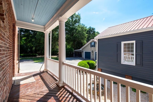 116 Jackson Rd, Jackson, SC 29831 - wooden terrace with a porch, an outbuilding, and a garage