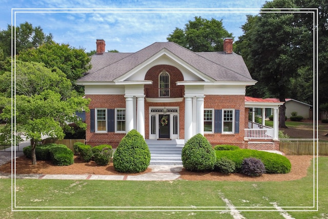 116 Jackson Rd, Jackson, SC 29831 - view of front of home featuring brick siding and a chimney