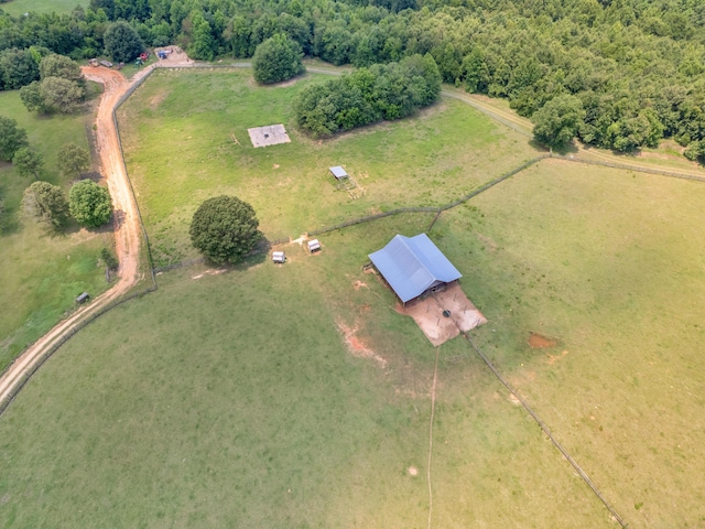 birds eye view of property featuring a rural view