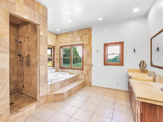 bathroom with plenty of natural light, plus walk in shower, and tile patterned flooring