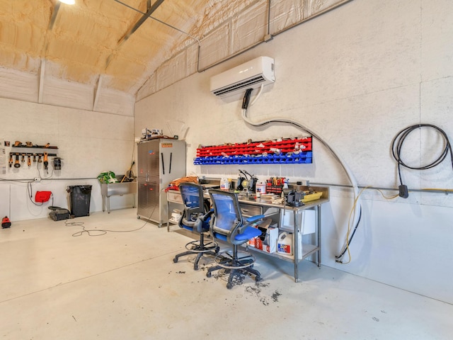 garage with a wall mounted air conditioner