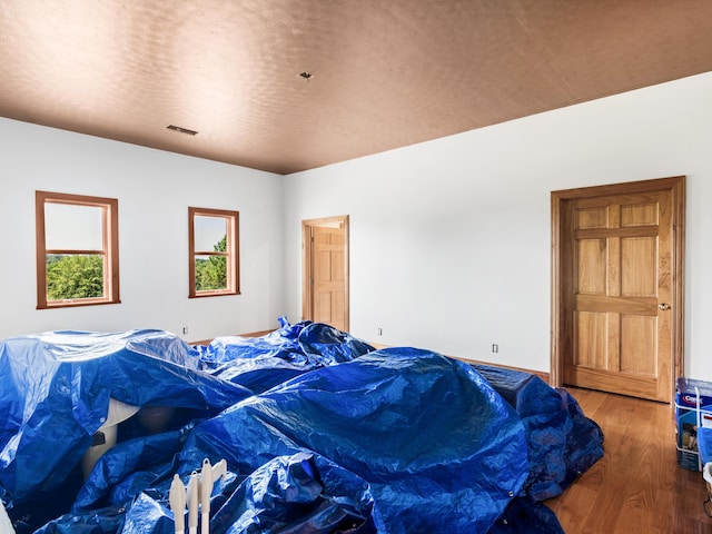 bedroom featuring hardwood / wood-style floors