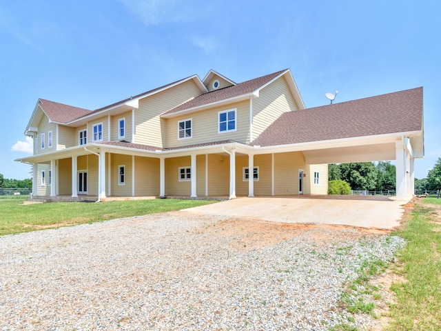 view of front of house featuring a carport