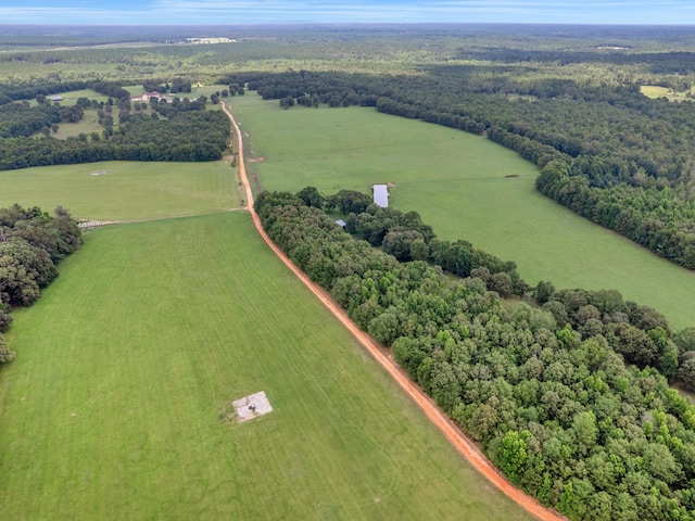 birds eye view of property featuring a rural view