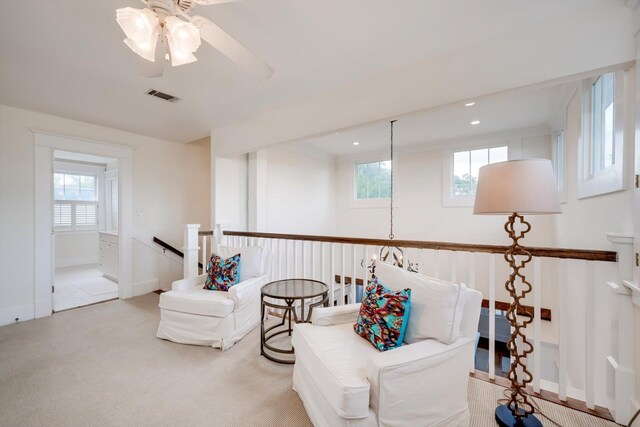 2619 Raymond Ave, Augusta, GA 30904 - living area with a wealth of natural light, a ceiling fan, an upstairs landing, and visible vents