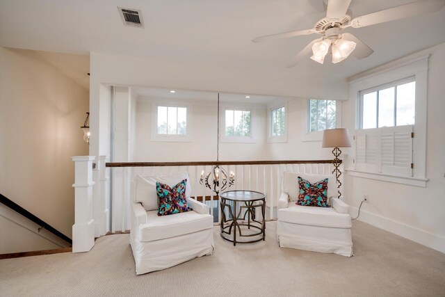 2619 Raymond Ave, Augusta, GA 30904 - living area featuring visible vents, carpet, a wealth of natural light, and an upstairs landing