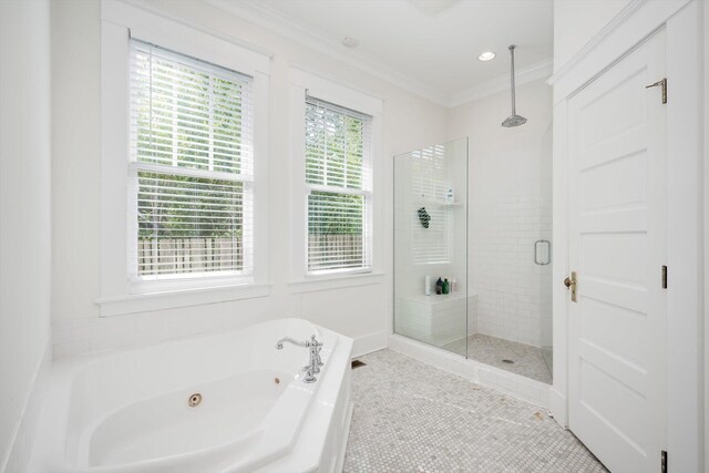 2619 Raymond Ave, Augusta, GA 30904 - bathroom featuring a whirlpool tub, a shower stall, ornamental molding, and tile patterned flooring