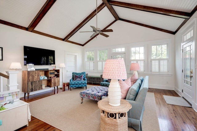 2619 Raymond Ave, Augusta, GA 30904 - living area with vaulted ceiling with beams, baseboards, ceiling fan, and wood finished floors