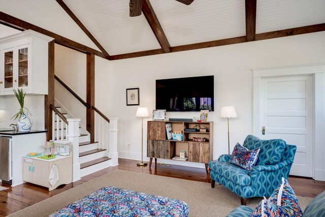 2619 Raymond Ave, Augusta, GA 30904 - living room featuring lofted ceiling with beams, ceiling fan, wood finished floors, and stairway