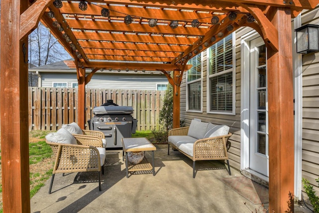 view of patio featuring an outdoor living space, area for grilling, and a pergola