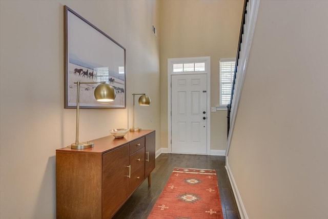 doorway to outside featuring dark hardwood / wood-style floors