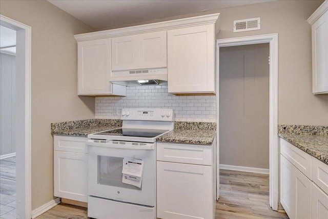 kitchen featuring white cabinetry, custom range hood, white electric range, and light hardwood / wood-style flooring