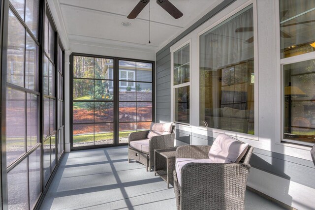 sunroom / solarium with ceiling fan