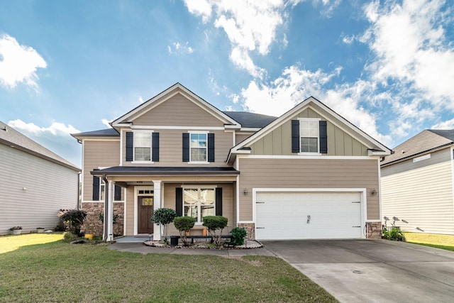 craftsman-style home featuring a garage and a front lawn