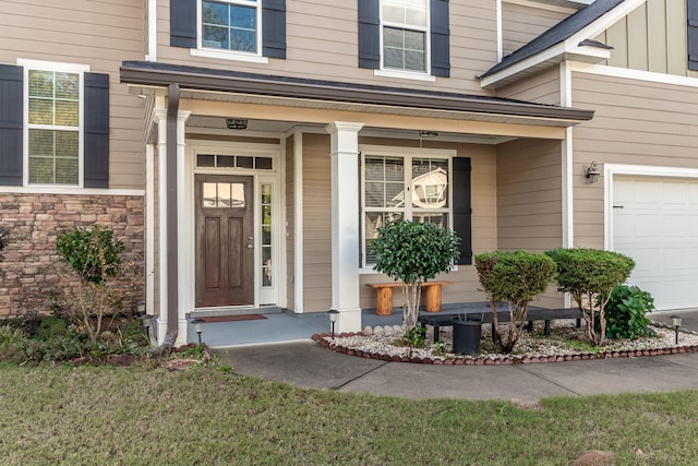 entrance to property featuring a garage