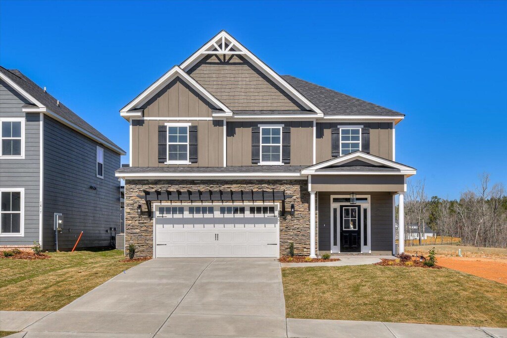 craftsman-style home with a garage