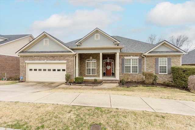 view of front facade featuring a garage and a front yard