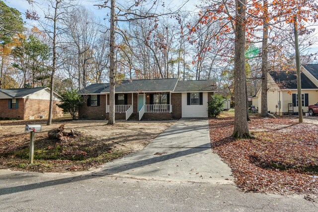 ranch-style house with a porch