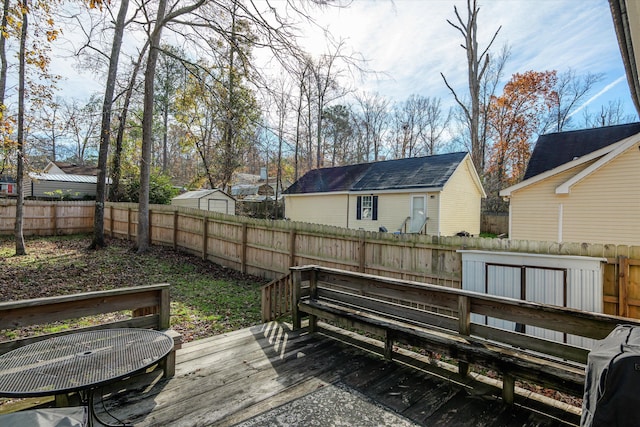 deck with an outdoor structure