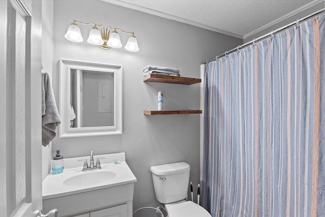 bathroom with vanity, a textured ceiling, crown molding, toilet, and curtained shower