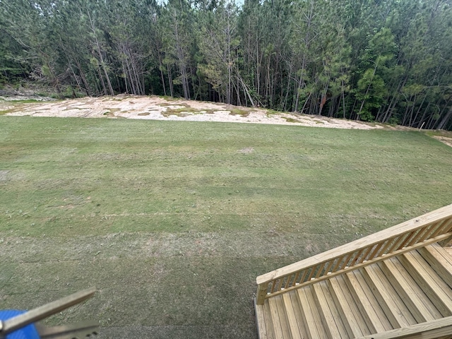 view of yard featuring a view of trees