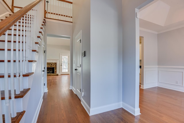 524 Jutland Way, Evans, GA 30809 - hall with wood finished floors, ornamental molding, stairway, and wainscoting