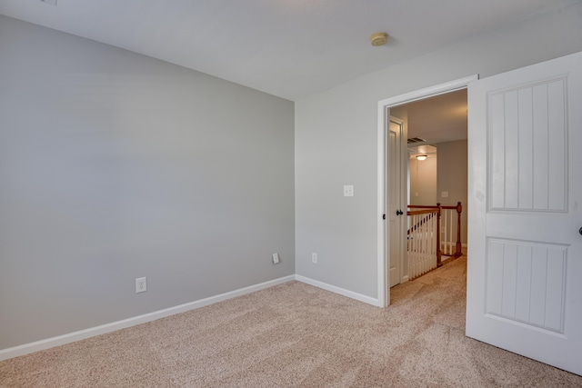 524 Jutland Way, Evans, GA 30809 - empty room featuring light carpet and a smoke detector