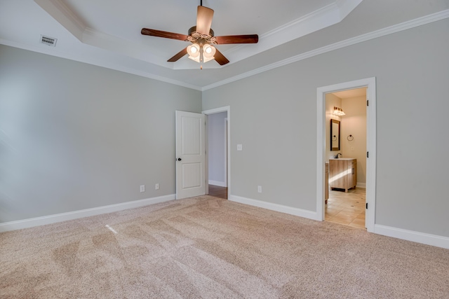 524 Jutland Way, Evans, GA 30809 - unfurnished bedroom featuring carpet, a raised ceiling, ornamental molding, ensuite bathroom, and ceiling fan