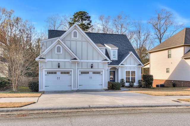 524 Jutland Way, Evans, GA 30809 - view of front of house featuring board and batten siding, roof with shingles, and driveway