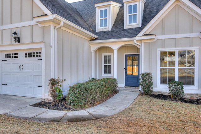524 Jutland Way, Evans, GA 30809 - property entrance featuring board and batten siding, roof with shingles, and an attached garage