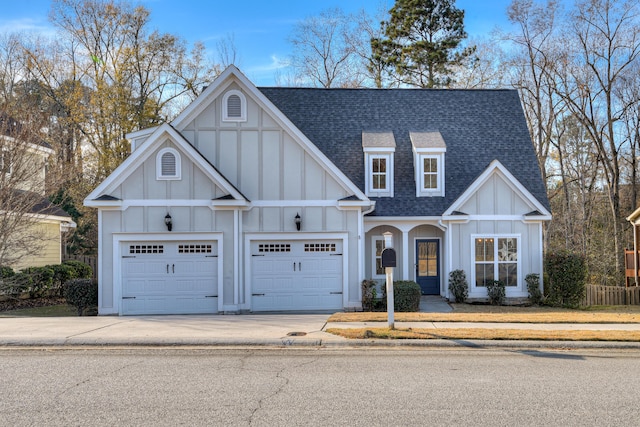 524 Jutland Way, Evans, GA 30809 - view of front facade with a shingled roof, board and batten siding, concrete driveway, and a garage