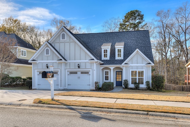 524 Jutland Way, Evans, GA 30809 - modern inspired farmhouse with board and batten siding, a shingled roof, a garage, and concrete driveway