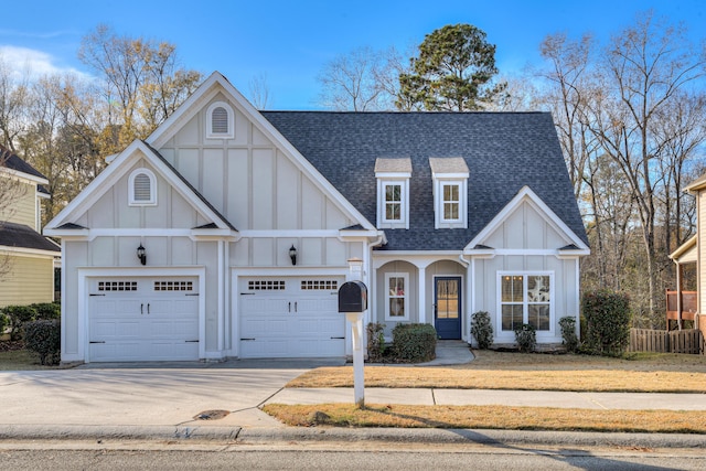 524 Jutland Way, Evans, GA 30809 - view of front of property featuring board and batten siding, a shingled roof, a garage, and concrete driveway
