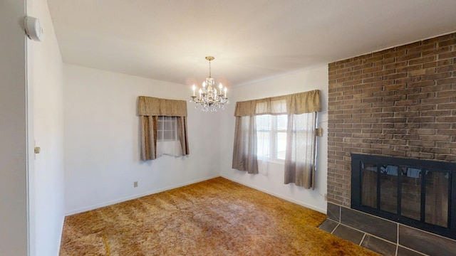 interior space with a brick fireplace, baseboards, an inviting chandelier, and carpet floors